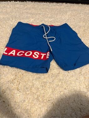 Lacoste Blue Swim Trunks with Red Logo Stripe